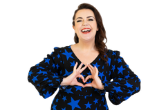 Woman wearing a black dress with blue star patterns, making a heart shape with her hands on a white background
